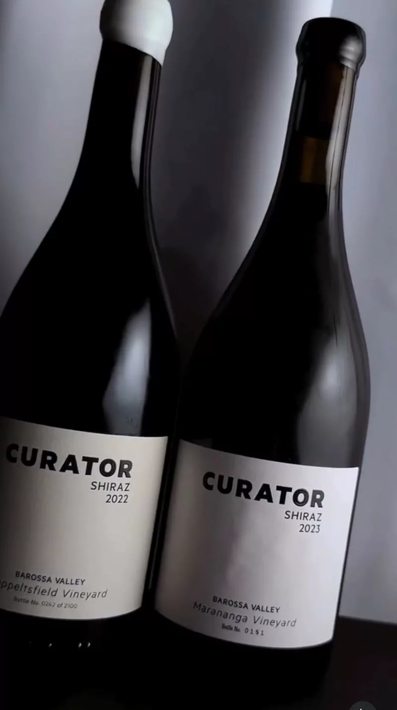 Curator Wine Co. Shiraz 2022 and Shiraz 2023 bottles displayed side by side, showcasing premium Barossa Valley single-vineyard vintages.